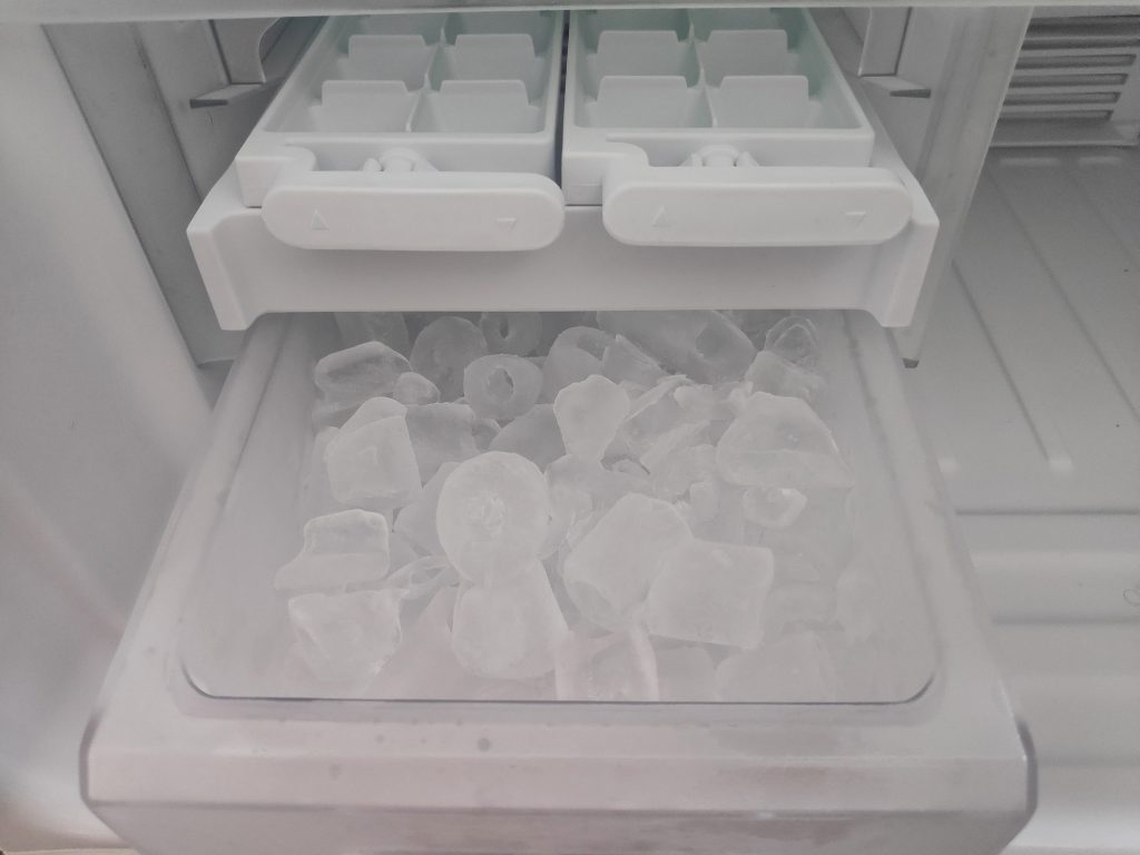 Ice maker container in the refrigerator.